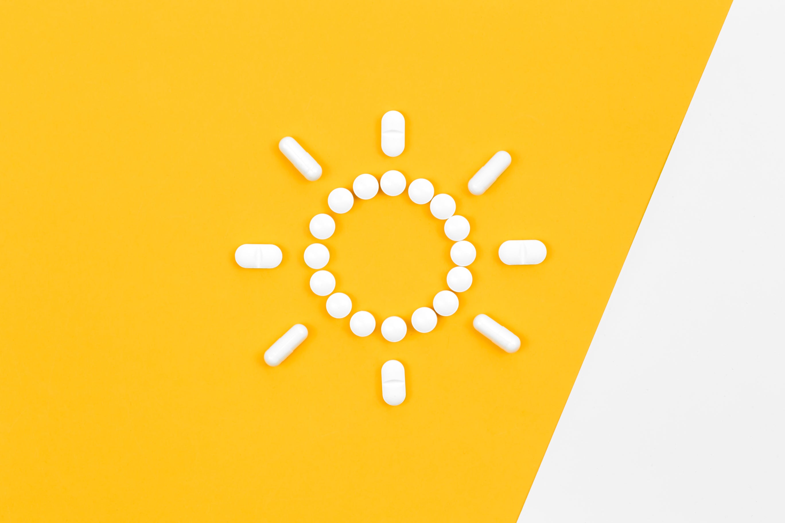 capsule cu vitamina D în formă de soare