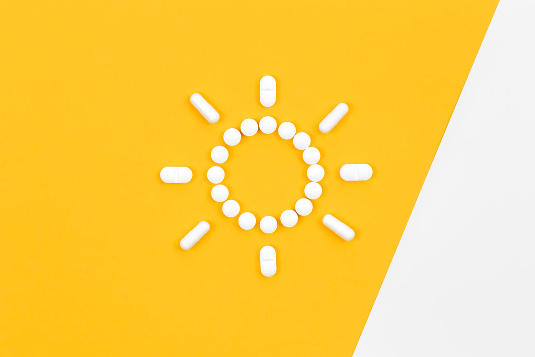 capsule cu vitamina D în formă de soare